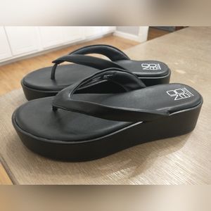 Black platform flip flops